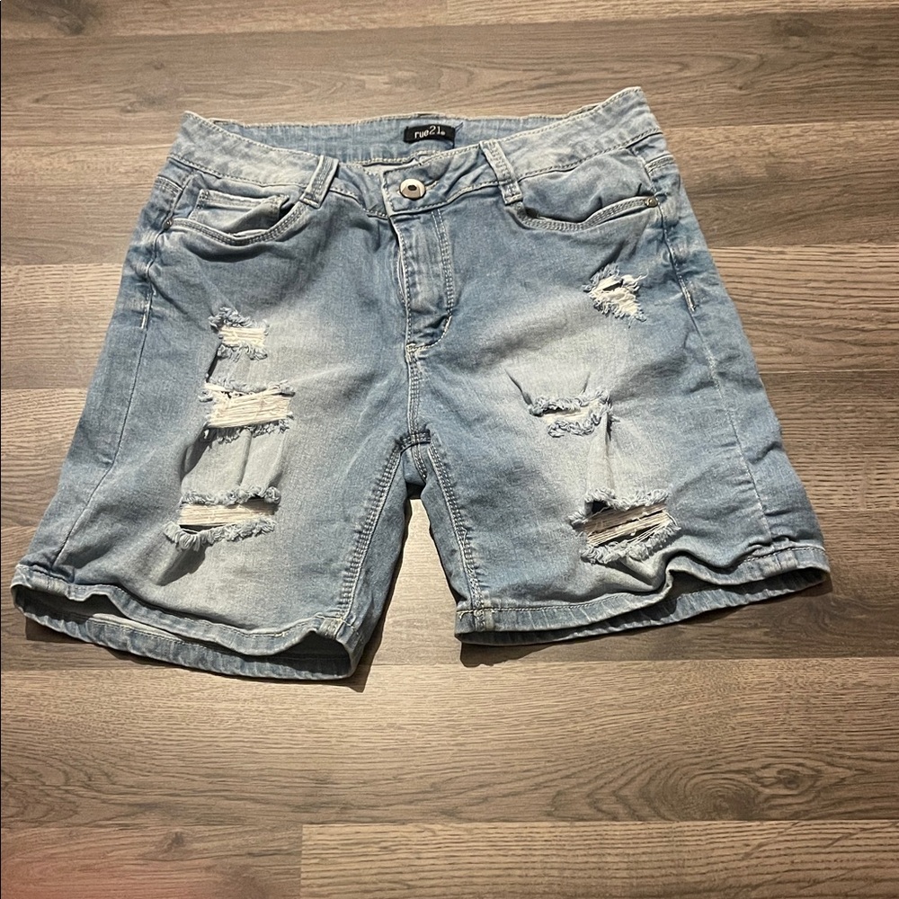 Light blue women’s holy jean shorts